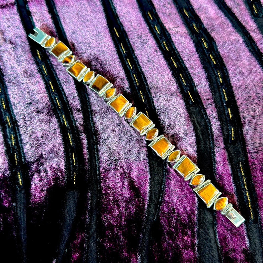 Tigers eye 950 sterling silver from Mexico measures 7 1/2” long!